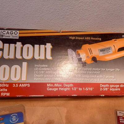 LOT 62  NEW CUT OUT TOOL WITH BLADES