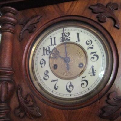 Antique Pendulum Clock in Wood Case