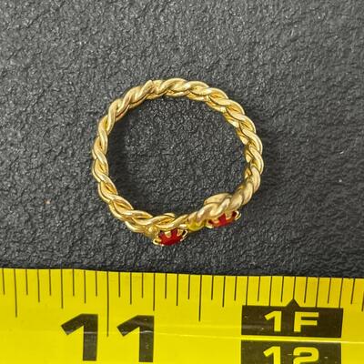GOLD TONED RING W/ RED STONES - SIZE 6