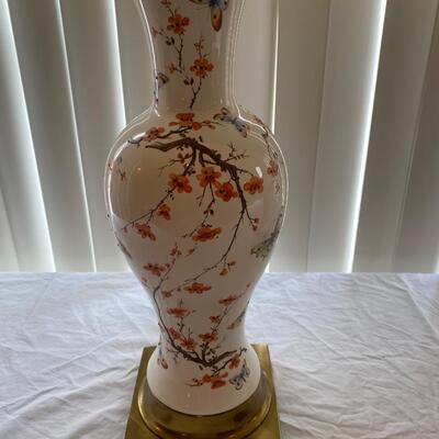 Pair of vintage floral ceramic lamps with brass finish bases
