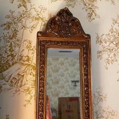 Pair of decorative gold mirrors