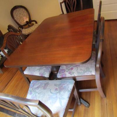 Vintage Duncan Phyfe Table with Six Chairs (One is a Carver Chair with Arms)