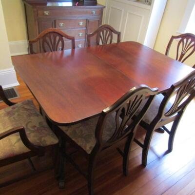 Vintage Duncan Phyfe Table with Six Chairs (One is a Carver Chair with Arms)