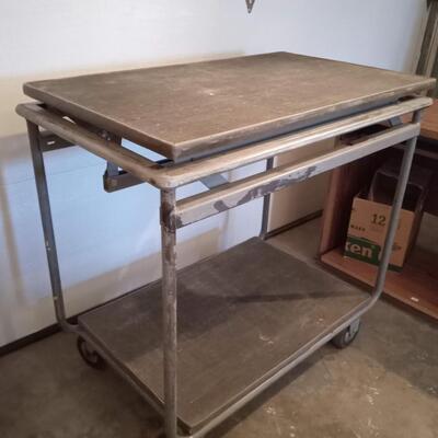 LOT 117  TWO TIER UTILITY CART ON CASTERS
