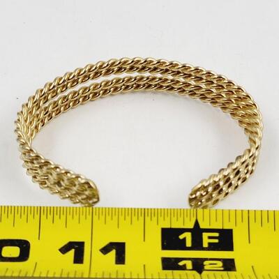 FANTASTIC TWISTED METAL GOLD TONED BRACELET