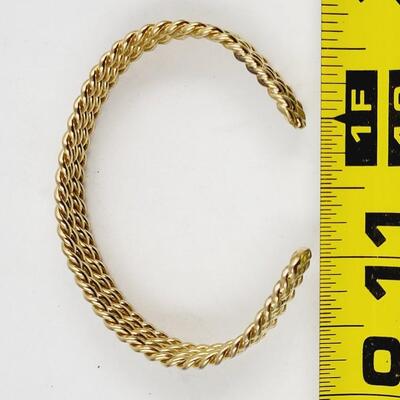 FANTASTIC TWISTED METAL GOLD TONED BRACELET