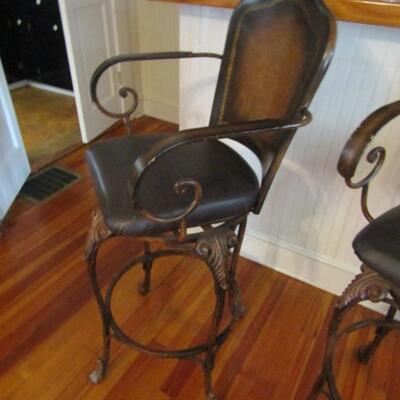 Pair of Swiveling Barstools- Heavy Wrought Metal Frame with Faux Leather Seats