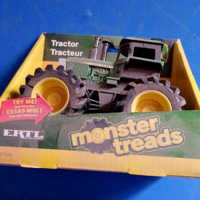 LOT 150   MONSTER TREADS TOY TRACTOR