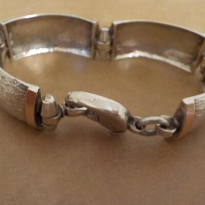 Split Cuff Sterling Bracelet with gold trim.