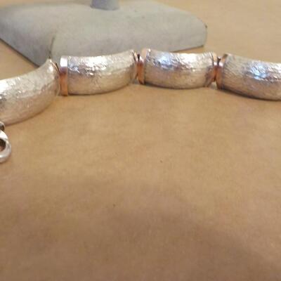 Split Cuff Sterling Bracelet with gold trim.