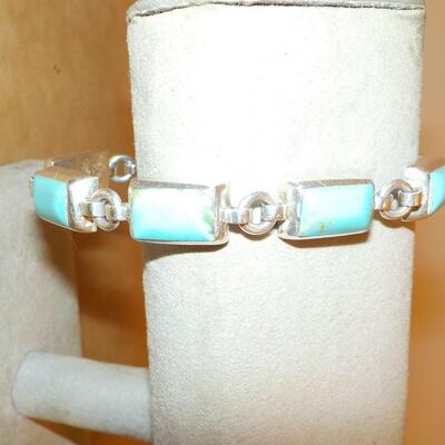 Turquoise Sterling silver bracelet with push lock.