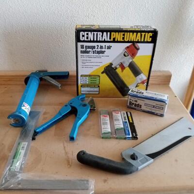LOT 150  NEW PNEUMATIC NAILER/STAPLER, BRADS AND SOME HAND TOOLS