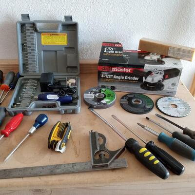 LOT 139  NEW ANGLE GRINDER, ROTARY TOOL AND MORE