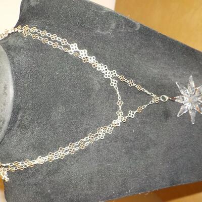 Crystal Star and double 38 in. chain. Brilliant looking.