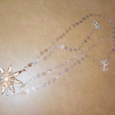 Crystal Star and double 38 in. chain. Brilliant looking.