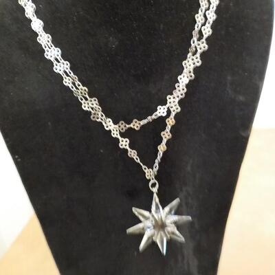 Crystal Star and double 38 in. chain. Brilliant looking.