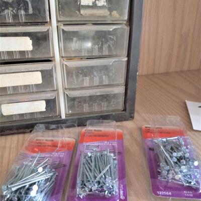 LOT 31  TWO HARDWARE ORGANIZER FULL OF HARDWARE AND MORE
