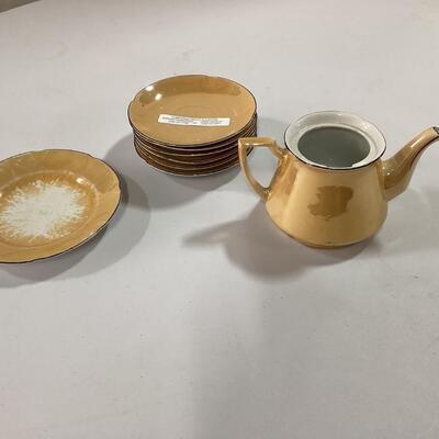Luster ware Teapot and saucers