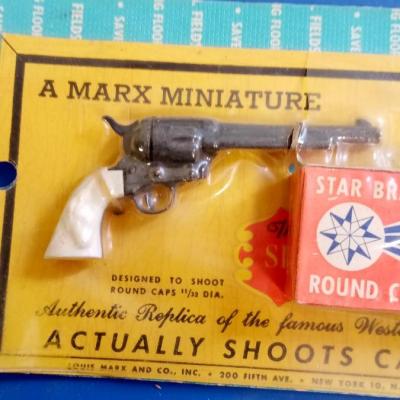 LOT 162   MARX MINIATURE CAP GUN WITH CAPS