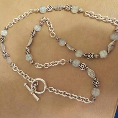 22 in. Sterling silver loop and bead necklace.