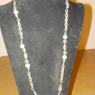 22 in. Sterling silver loop and bead necklace.