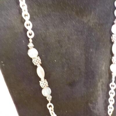 22 in. Sterling silver loop and bead necklace.