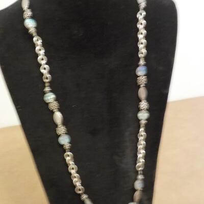 22 in. Sterling silver loop and bead necklace.