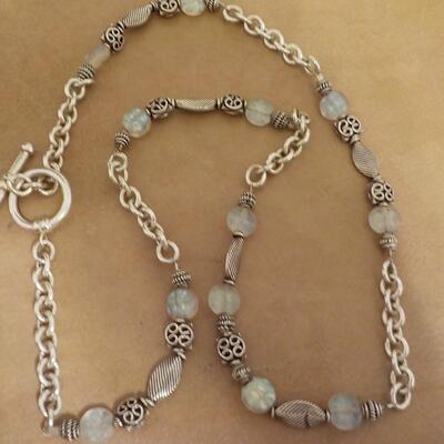22 in. Sterling silver loop and bead necklace.
