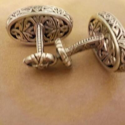 Sterling silver hand crafted cuff links.