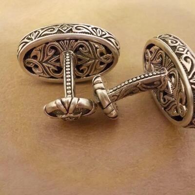 Sterling silver hand crafted cuff links.