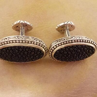 Sterling silver hand crafted cuff links.