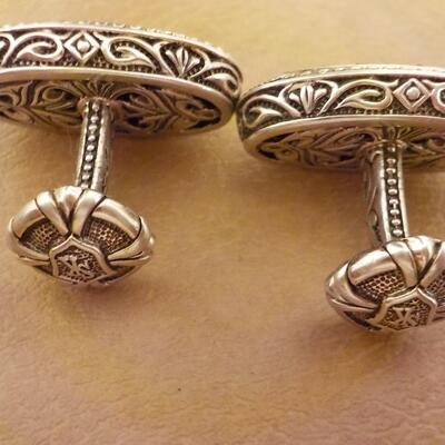 Sterling silver hand crafted cuff links.