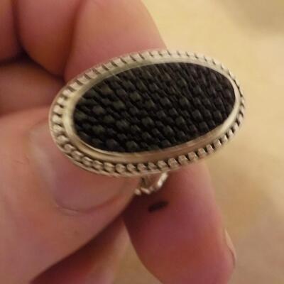 Sterling silver hand crafted cuff links.
