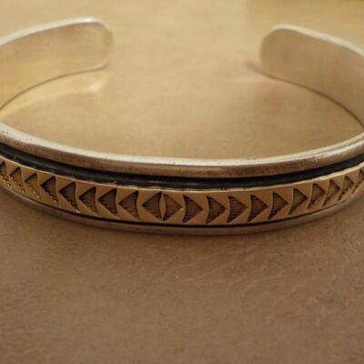 Sterling silver curb Bracelet with 14k inlay.