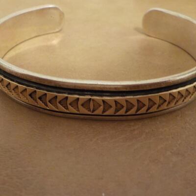 Sterling silver curb Bracelet with 14k inlay.