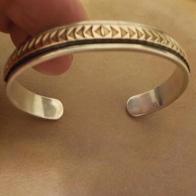 Sterling silver curb Bracelet with 14k inlay.