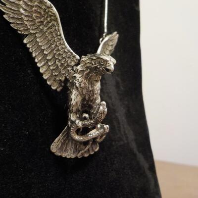 Sterling silver Eagle attacking a snake/ wings move. Necklace.