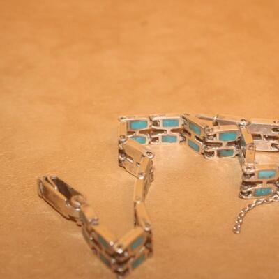 Torques inlay curb bracelet.