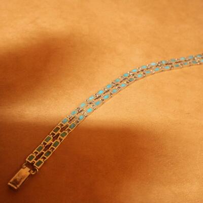 Torques inlay curb bracelet.