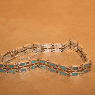 Torques inlay curb bracelet.