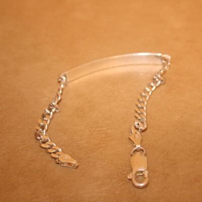 Sterling silver 1/2 curb and chain.