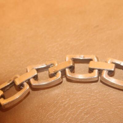 Open square sterling silver chain.