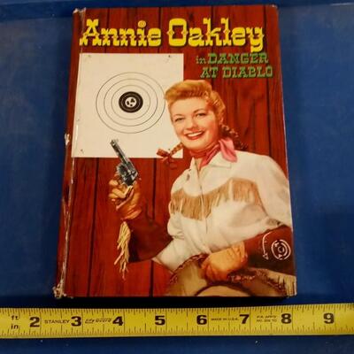 LOT 182   OLD ANNIE OAKLEY BOOK
