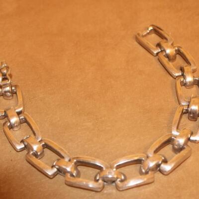 Sterling silver open chain square look bracelet.
