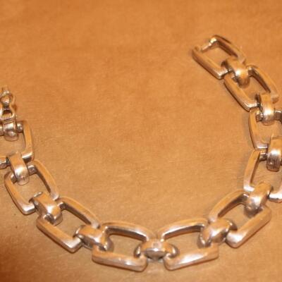 Sterling silver open chain square look bracelet.