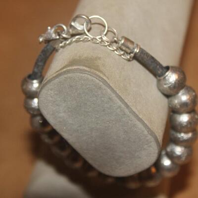 Sterling silver flex bracelet.