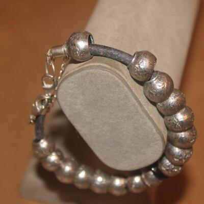 Sterling silver flex bracelet.