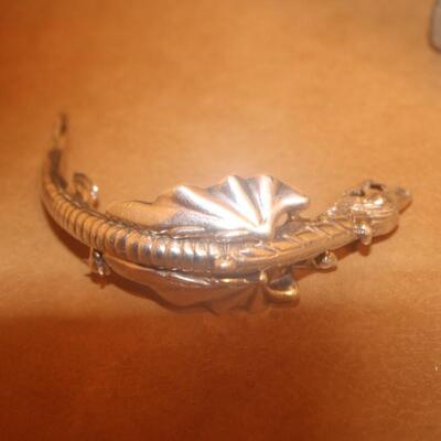 Sterling silver dragon pin.