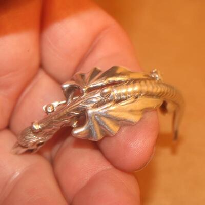 Sterling silver dragon pin.
