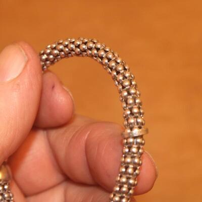 Sterling silver flexi-cable design .